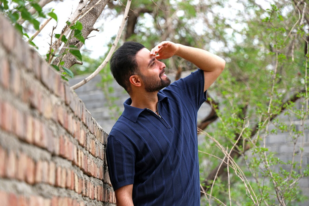 Smiling man in his thirties portrait outdoors