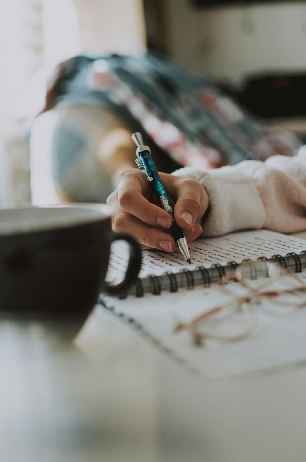 person journaling quietly