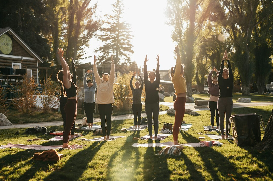 people doing yoga together